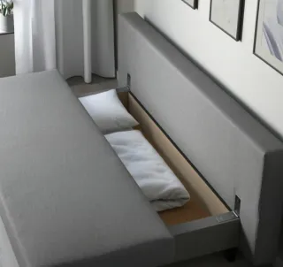 Divano letto beige a 3 posti