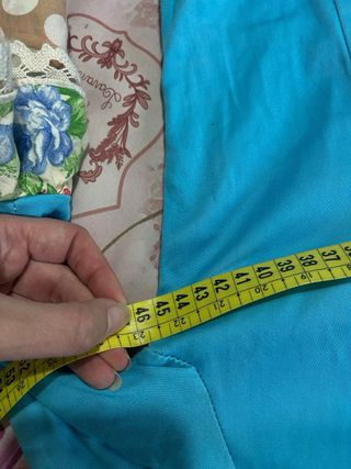 Traje de flamenca azul con volantes