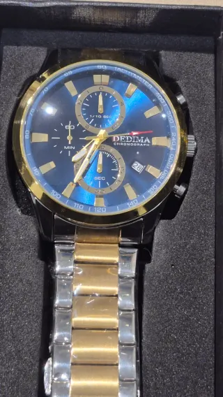 SUPER OFERTA reloj nuevo con sus plásticos.