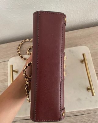 Bolso Michael Kors con tachuelas doradas