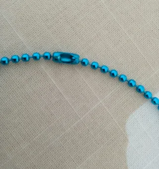 Collana con charm tartaruga e conchiglia