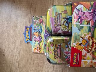 Latas tin pokemon TCG