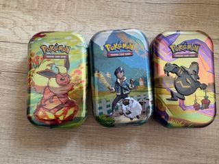 Latas tin pokemon TCG
