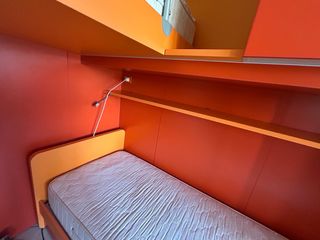 Cameretta con doppio letto per bambini e ragazzi