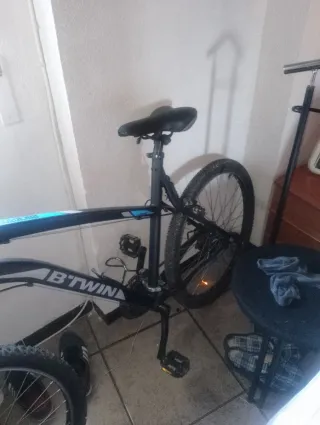 Bicicleta montaña BTWIN 18 marcha. amortiguador.