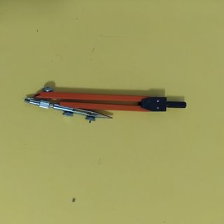 Compás vintage EDE naranja