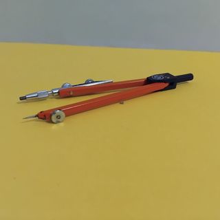 Compás vintage EDE naranja