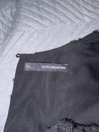 Blusa negra con pedrería