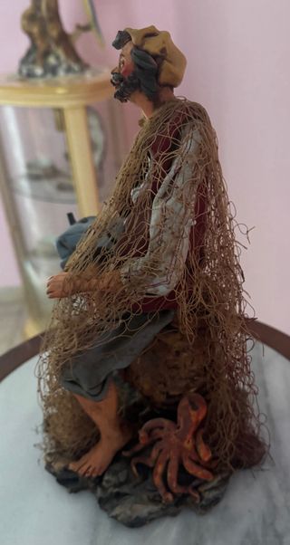 Statuetta presepe pescatore con rete e pesce