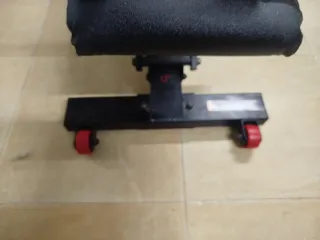 Banco de pesas con barra y discos