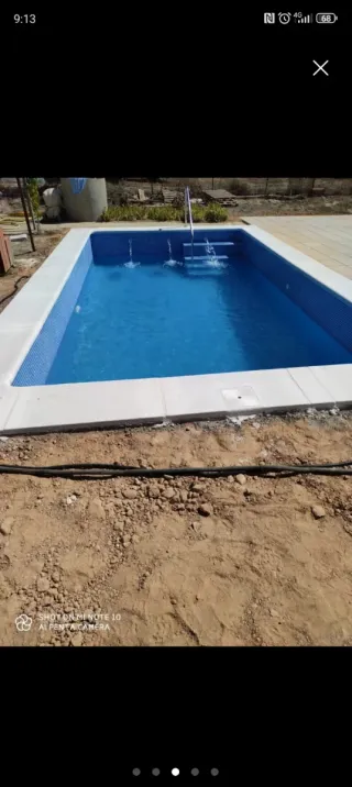 Piscina de obra con escaleras