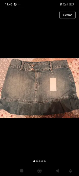 Conjunto : cazadora Bomber y falda de Mango.