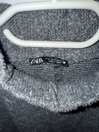 Jersey gris cuello alto