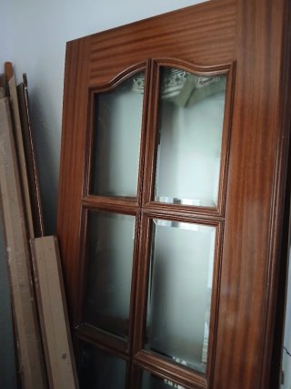 Puerta doble madera y cristal salón
