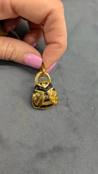 Charm Braccialini in argento dorato