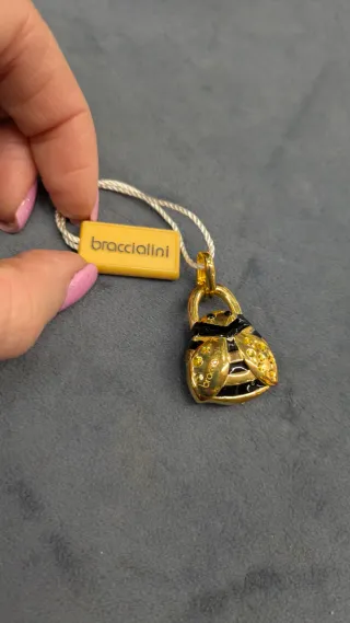 Charm Braccialini in argento dorato