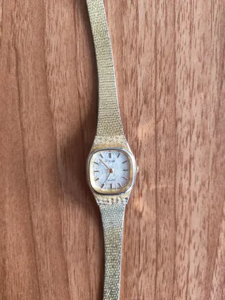 Reloj Citizen Dorado y Plateado