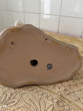 Figura de porcelana niño con carretilla