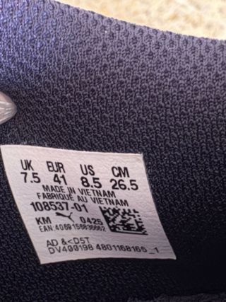 Botas de fútbol Puma azules y rojas