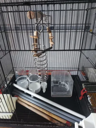 Jaula desmontable para pájaros con accesorios