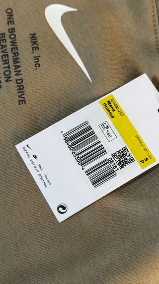 Sudadera Nike con capucha beige