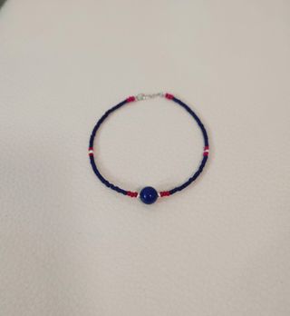 Pulsera plata con cierre y piedra azul