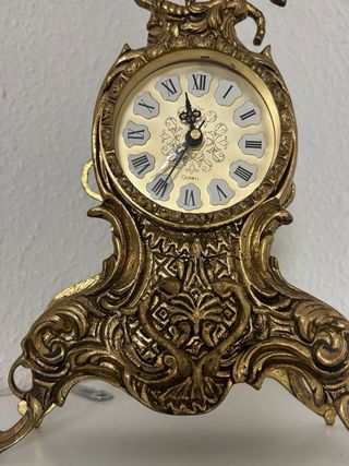 Reloj de sobremesa de bronce con figura ecuestre