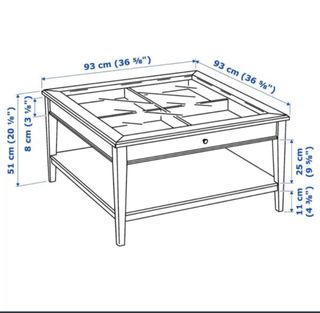 Mesa de centro de cristal y madera