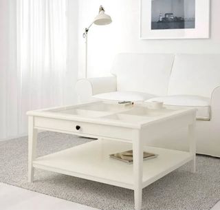 Mesa de centro de cristal y madera