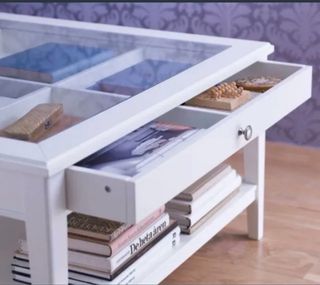 Mesa de centro de cristal y madera