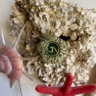 Collar erizo de mar plata y oro