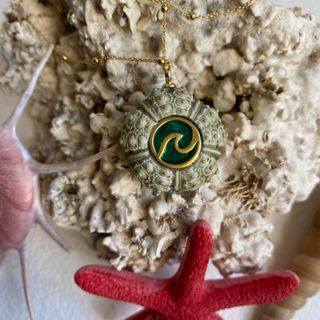 Collar erizo de mar plata y oro