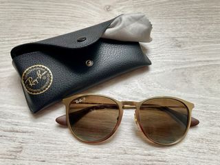 Gafas de sol Ray-Ban doradas y marrones