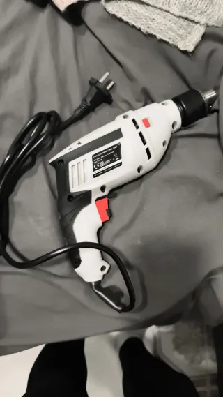 Taladro percutor eléctrico