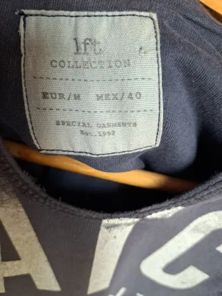 Sudadera con capucha azul y gris lefties