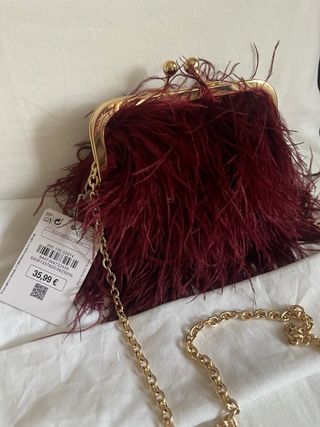 Bolso fiesta plumas burdeos