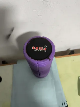 Rodillo de masaje púrpura