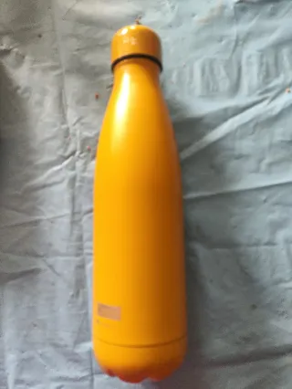 Botella de agua naranja 500 ml.