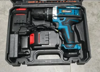 Taladro Gisam con maletín y accesorios