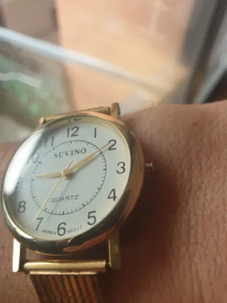 Reloj Suvino Dorado y Blanco