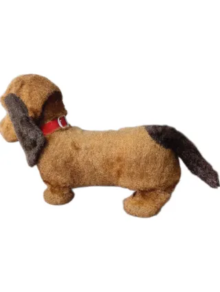 Antiguo perro de juguete