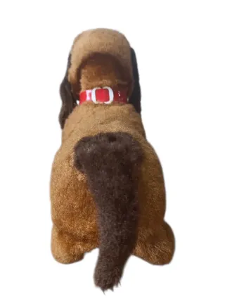 Antiguo perro de juguete