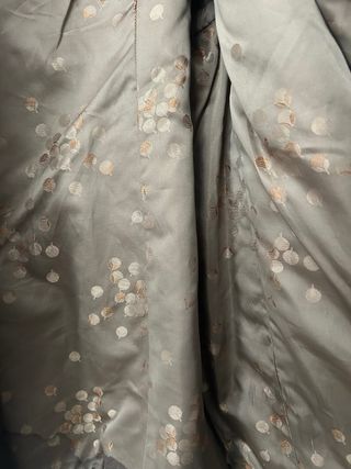 Abrigo de pelo marrón con cinturón