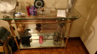 Apliques de pared de cristal y metal dorados