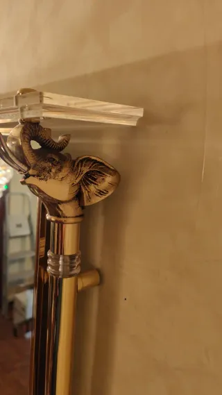 Apliques de pared de cristal y metal dorados