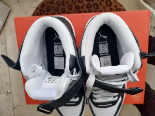 Zapatillas Puma altas negras y blancas