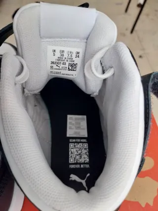 Zapatillas Puma altas negras y blancas