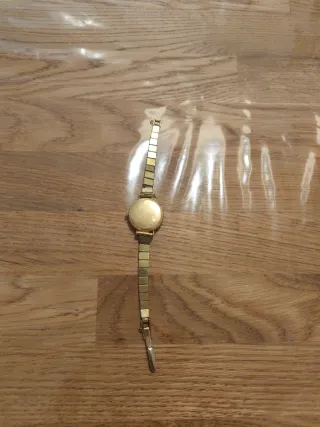 Reloj LONGINES  antiguo de oro macizo con rubíes,