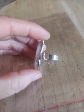 Anello inox con pietra rosa regolabile