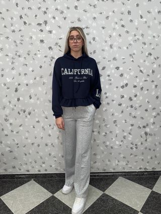 Sudadera azul con volantes
